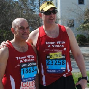 Erich Manser and his guide Peter Sagal at the 2014 Boston Marathon