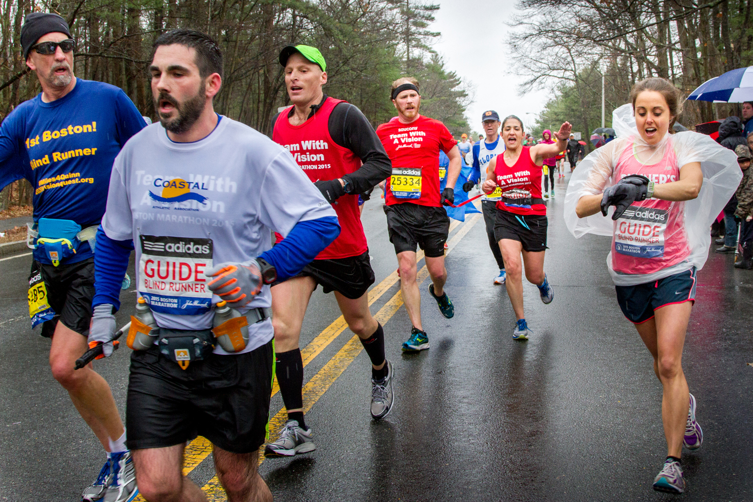 Randy Pierce and guides as well as Kyle Robidoux and guides running in the Boston Marathon